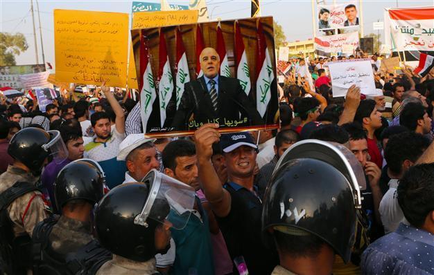 Iraqs Abadi, in reform push, reduces ministerial adviser positions