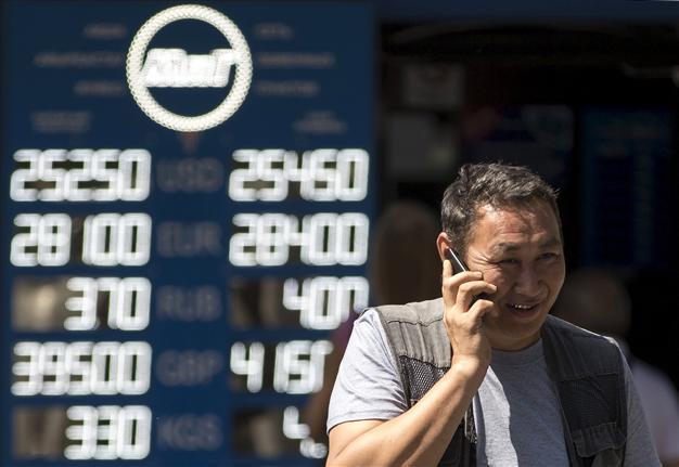 Kazakh currency falls 23 percent after switch to free-float