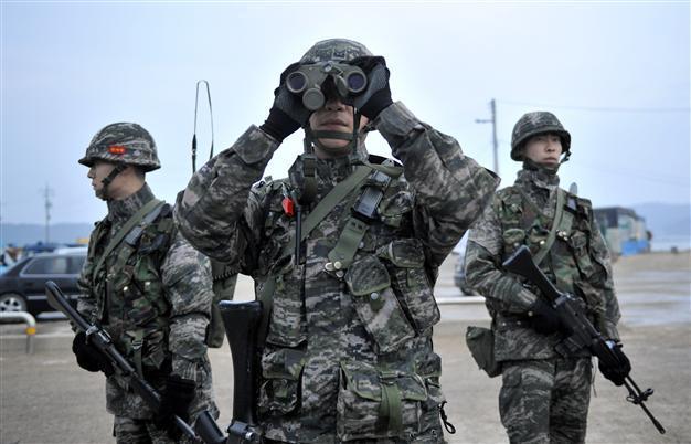 South Korea fires rounds at North in response to shell
