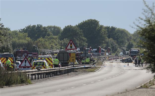 Seven killed at British airshow as jet crashes into road