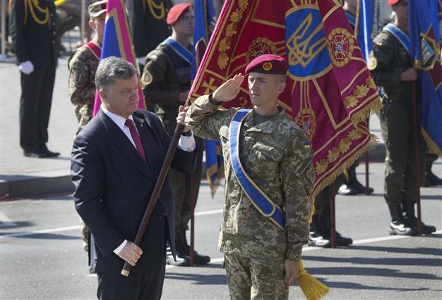 Ukraine leader accuses Russia of arms supplies to rebel east