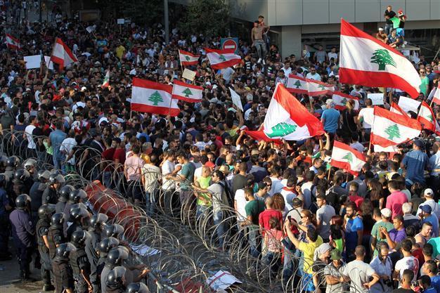 Lebanon protesters postpone garbage demo, army on streets