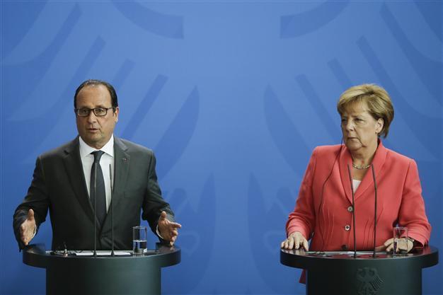 Merkel, Hollande urge unified EU response to refugee crisis
