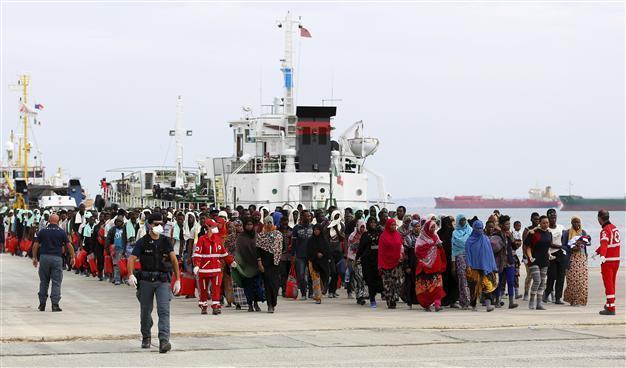 Italy hits back at Merkel in migrants row