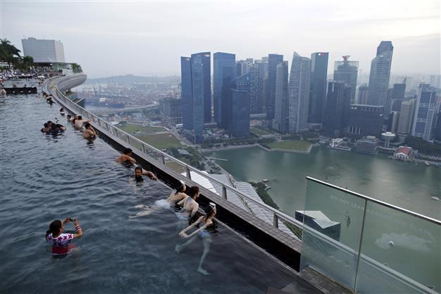 Singapore softens ban on HIV-positive visitors