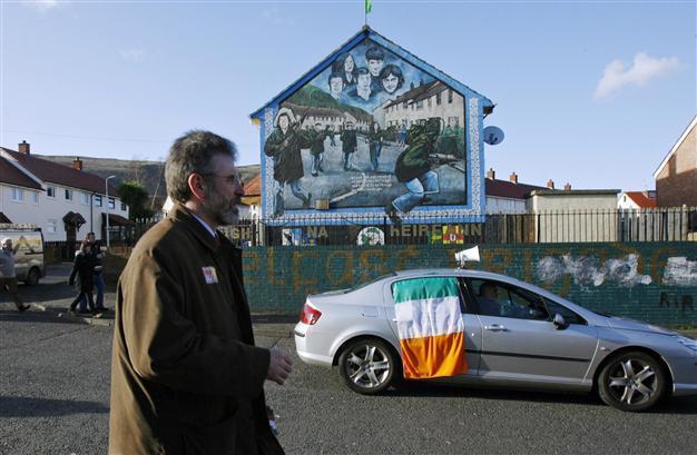 British PM calls for more talks to cool Northern Irish crisis