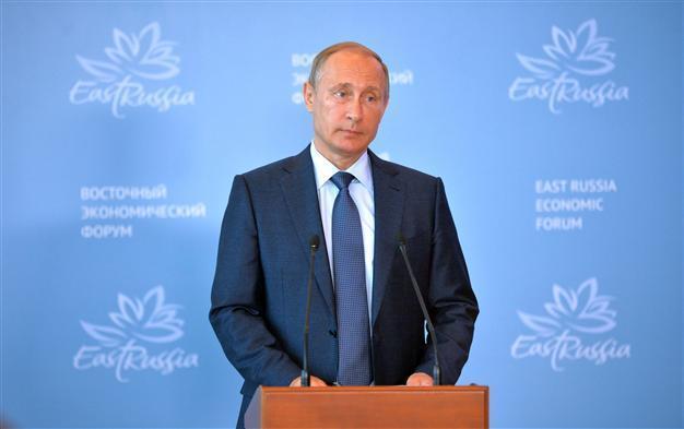 Putin says Assad agrees to early parliamentary polls