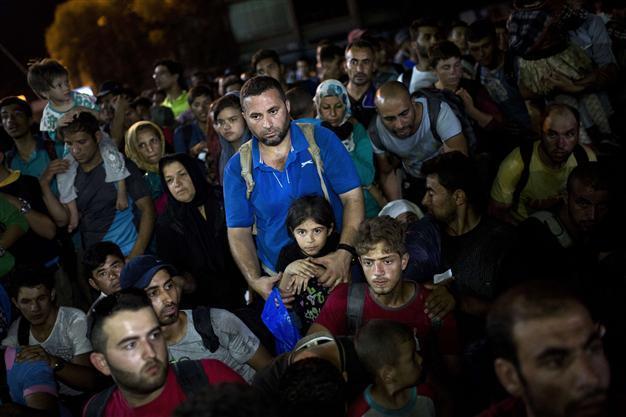 Fresh clashes on Lesbos as Britain, France pledge to take migrants