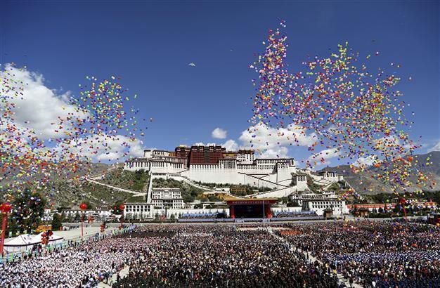 China denounces Dalai Lama at Tibet anniversary