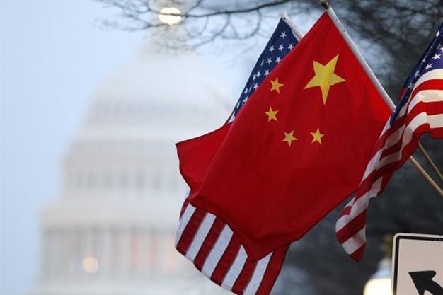 China will work with U.S. on hacking, defend its interests: official