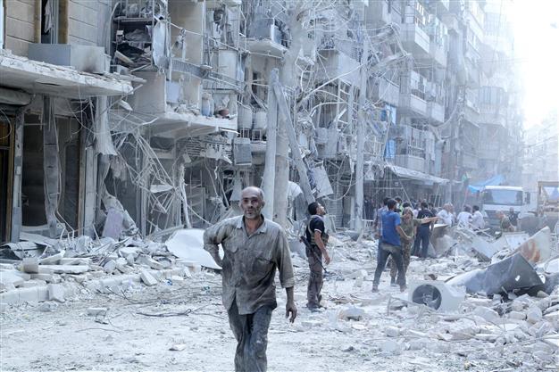 Barrel bombs kill 21 civilians near Syrias Daraa: Monitor