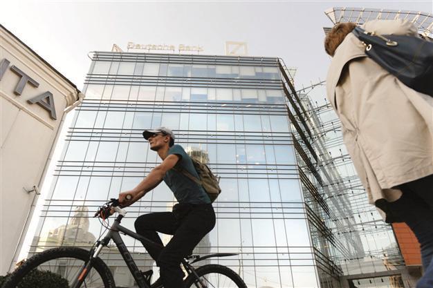 German business confidence edges higher