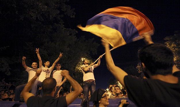 ‘Electric Yerevan’ protesters dig in as tensions flare in Armenia