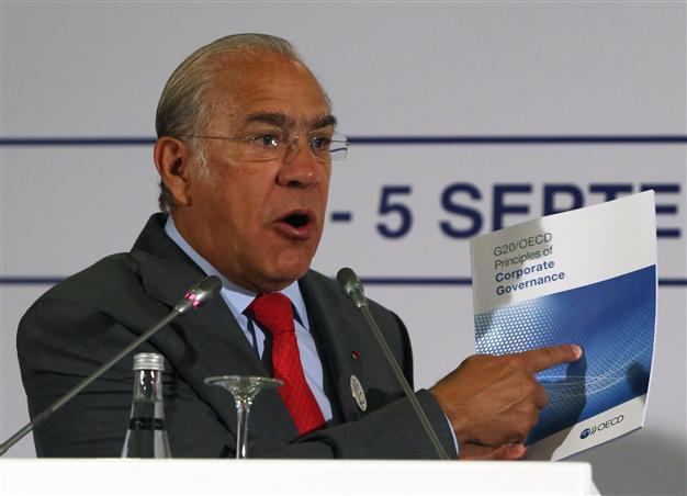OECD cuts global growth outlook for 2015, 2016