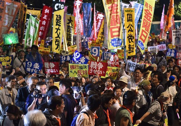 Support for Japans Abe sags after security bills passed