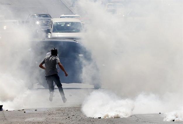 Palestinian dies, another shot with tensions high in West Bank