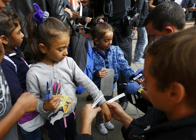 Amid migrant wave, German Turks point at past mistakes