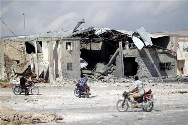Syrian army and Russian jets target rebels in western Syria