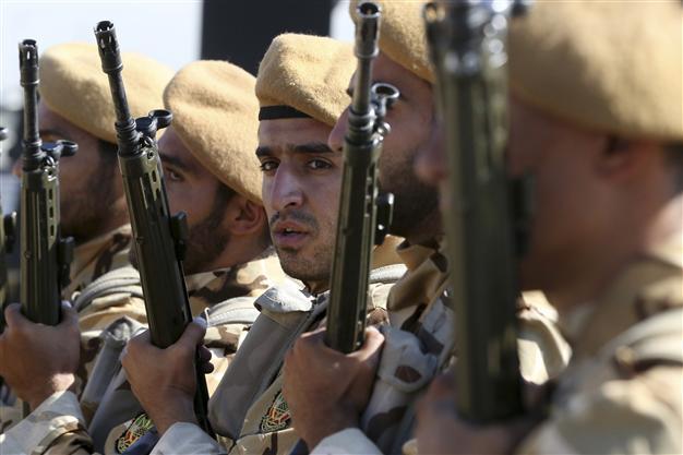 Using Russias cover, Iran begins sending fighters to Syria