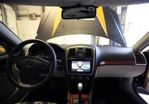 National car unveiled by minister sparks Cadillac debate