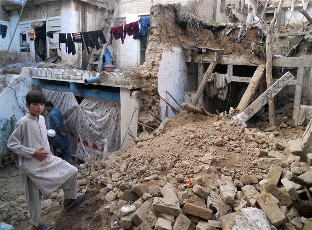 Rescuers race to reach quake zones in Afghanistan, Pakistan as toll nears 300