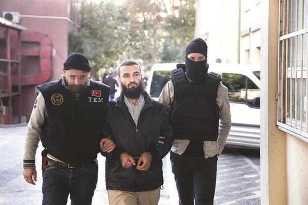 Two police officers killed in ISIL raid were victims of suicide bomber