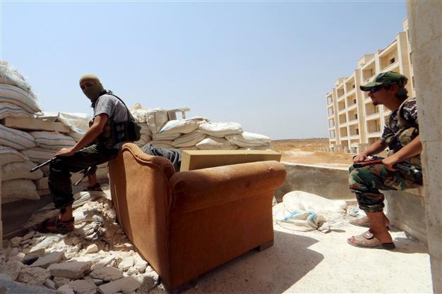 Nusra Front says withdraws from frontline against ISIL