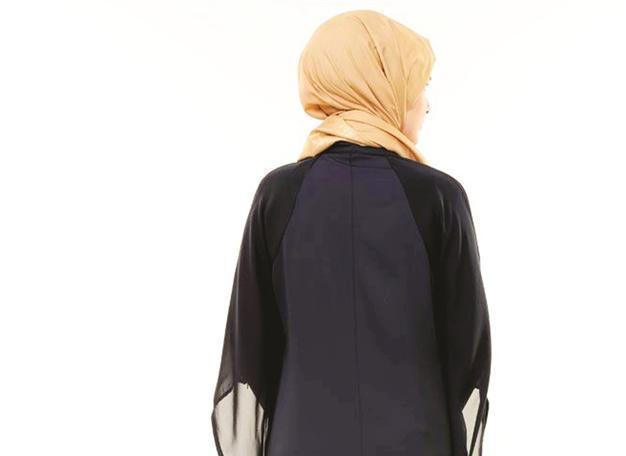 Asking headscarved women to remove topcoat for security check violates freedom: Court