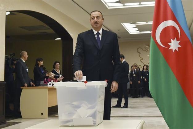 Azerbaijan president cements power in boycotted parliamentary polls