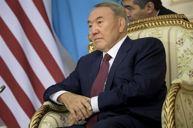 Energy-rich Kazakhstan dismisses national bank head as currency slumps