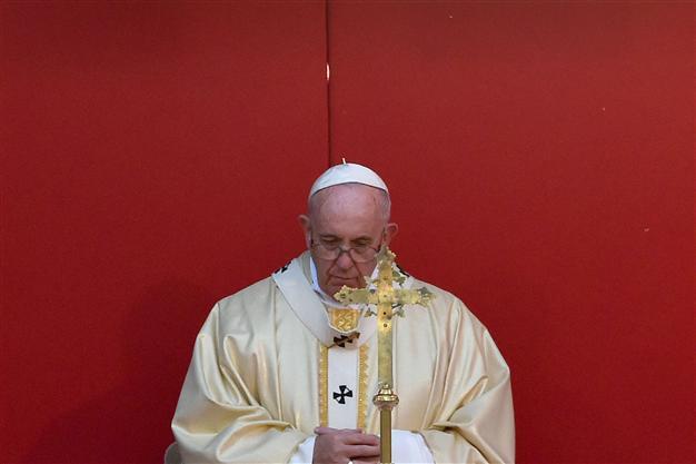 Vatican arrests cleric, laywoman suspected of leaking secret documents