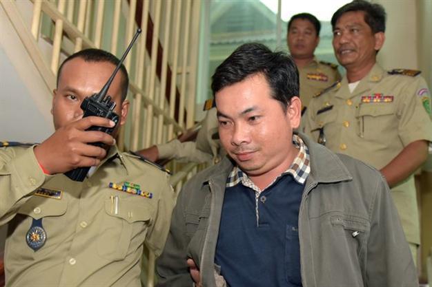 Cambodian charges 3 suspects after mob attack on opposition lawmakers