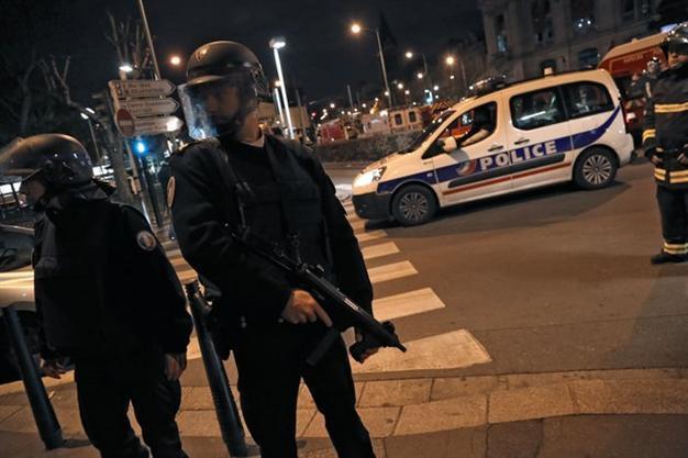 Two killed in Paris in raid on attack suspect