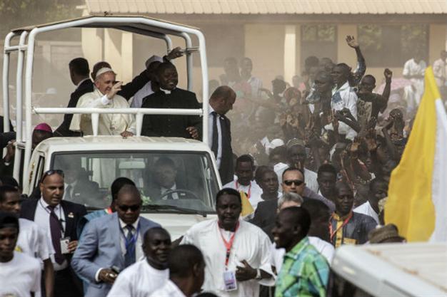 Pope says Christians, Muslims are brothers in war-torn CAfrican district