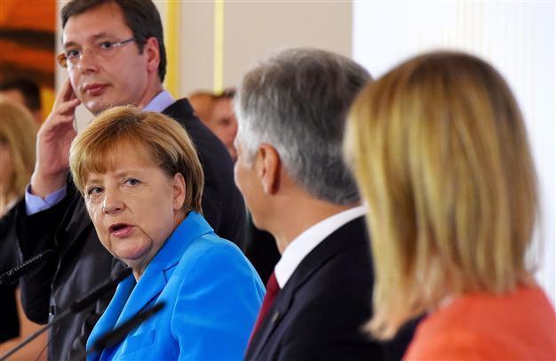 Merkel says Austrian migrant tragedy a ‘warning’