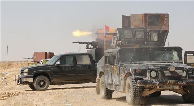 Azerbaijan sentences three to prison for fighting in Syria