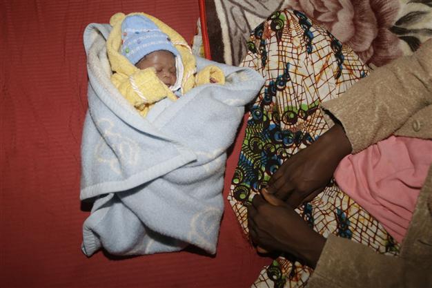 Ebola survivor who lost 21 relatives gives birth to baby boy