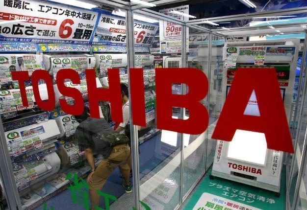 Scandal-hit Toshiba warns of $4.5 bln annual loss, job cuts