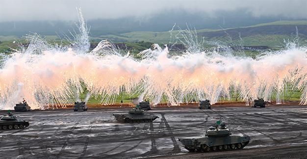 PM Abe’s cabinet approves largest defense budget