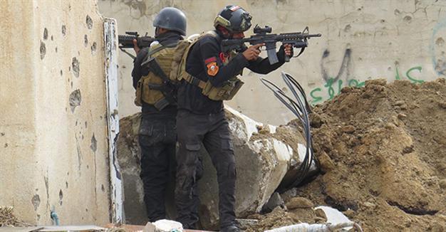 Bombs hamper troops two weeks after victory declared in Iraqs Ramadi