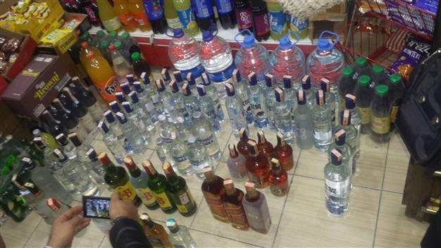 Death toll from bootleg alcohol rises to 19 as police detain 21 suspects