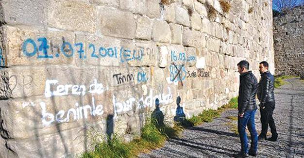‘Love’ graffiti on historic castle walls creates outrage
