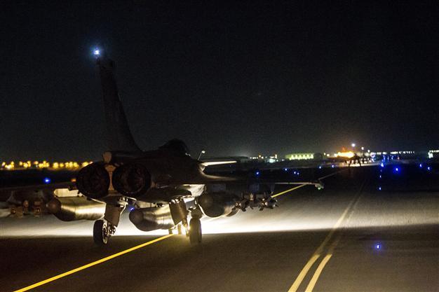 France mourns dead as warplanes pound ISIL stronghold in Syria