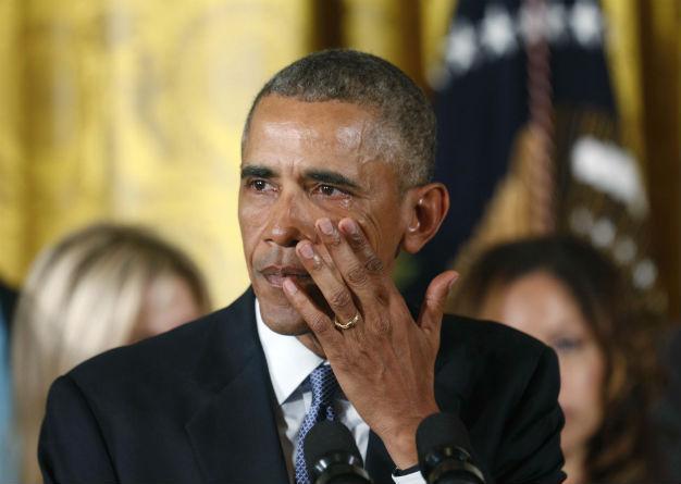 Obama, wiping tears, makes new push to tighten gun rules