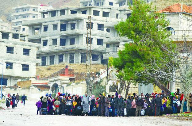 Medics race to save starving Syrians in besieged