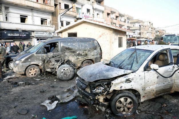 Bombs kill 22 at army checkpoint in Syria’s Homs: State TV