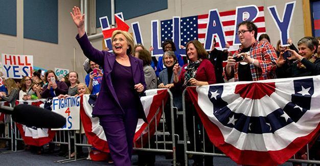 Clinton takes Iowa, beating back Sanders strong challenge