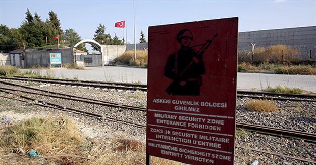 Walls and watchtowers rise as Turkey tries to seal border against ISIL
