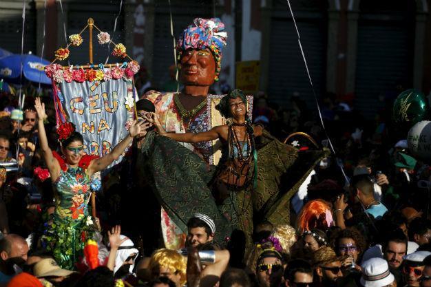 Rio Carnival dances toward wild finale, swatting Zika aside