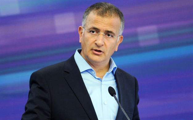 Turkish journalist wanted on terrorism charges